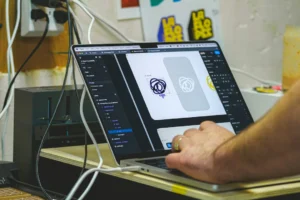 Person designing on a laptop computer screen